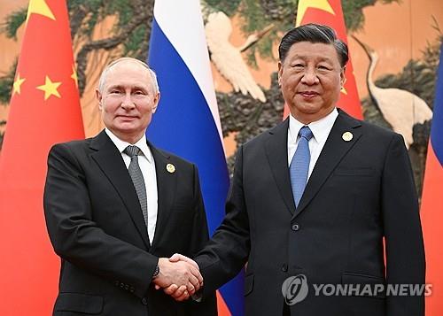 푸틴 러시아 대통령과 시진핑 중국 국가주석[타스=연합뉴스 자료사진. 재판매 및 DB금지]