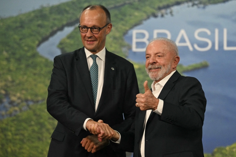 메르츠 독일 총리(왼쪽)와 룰라 브라질 대통령[AFP 연합뉴스 자료사진. 재판매 및 DB 금지]